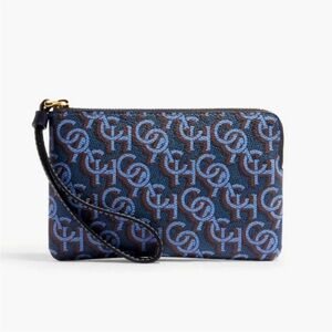 NWT Coach Small Wristlet wallet with strap,  Navy, blue and brown.